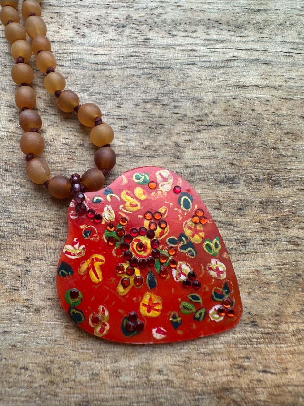 Vintage Chan Luu Necklace with hand-painted mother of pearl motif and beads.